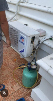 Servis AC isi freon