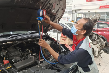 Service AC Mitsubishi Triton